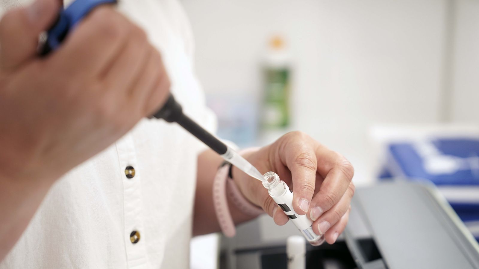 Close-up of a water sample being pipetted in the laboratory
