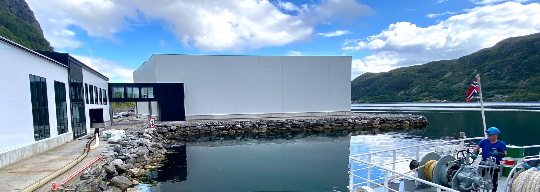 The OFS Måløy building on the shore of the Ulvesundet strait